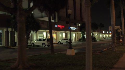 HALLANDALE - JUNE 17: Night video footage of a shopping center on Hallandale Beach Boulevard shot with a gimbal stabilized camera June 17, 2016 in Hallandale FL, USA