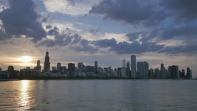 Chicago Skyline Reflected on the Lake at Sunset.
Video time lapse of Chicago downtown skyscrapers reflected on the Michigan lake from sunset to night.
Awesome Chicago city center skyline at night.
