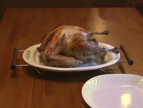 Time to carve the turkey. Video Stok