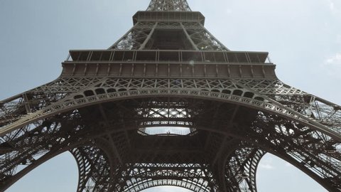 Slow tilt shot of the Eifel Tower in Paris, France