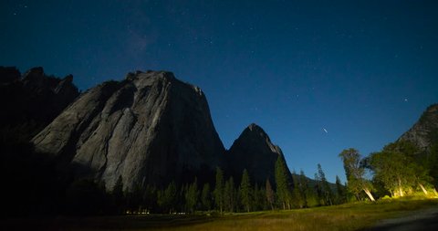 Yosemite National Park, California, USA - view of Yosemite valley with Cathedral Rocks from El Capitan Drive in the valley at night with stars and moonlight - Timelapse without motion - August 2013