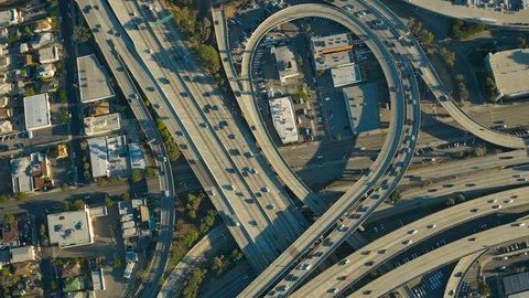 Los Angeles Aerial v132 Vertical shot looking down over downtown freeways panning.