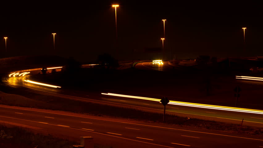 Streaks of lights from cars in the highway / 4k Timelapse