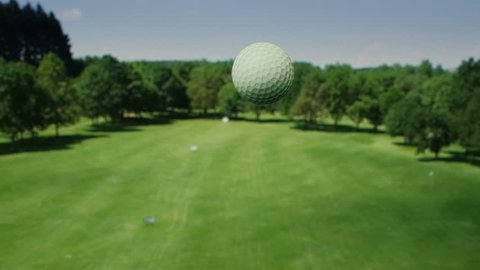 Aerial view of the golf ball. Shot in super slow motion.