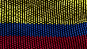 Flag of Colombia, consisting of many balls fluttering in the wind, on a black screen. Colored soccer balls forming fabric flag. Looped video.