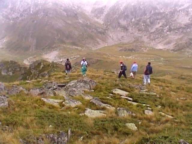 mountain landscape - people on a cliff