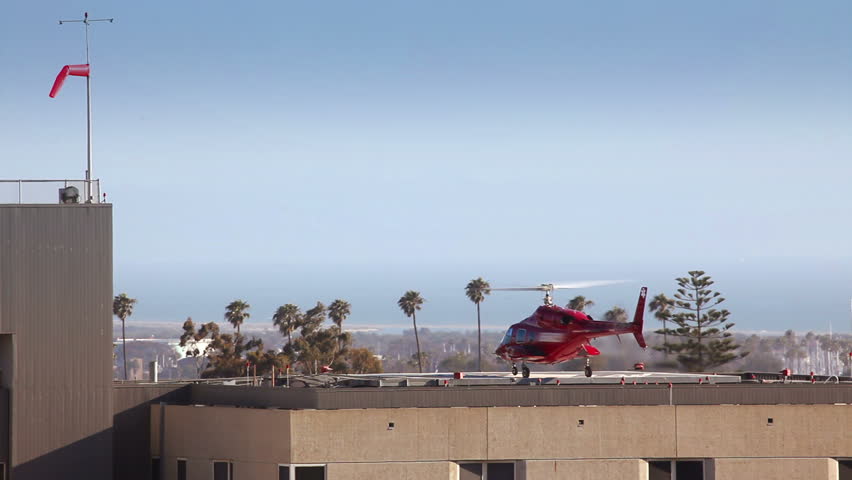 Helicopter Taking Off from Helipad