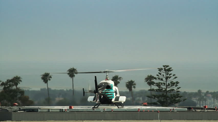 Helicopter Taking Off from Helipad