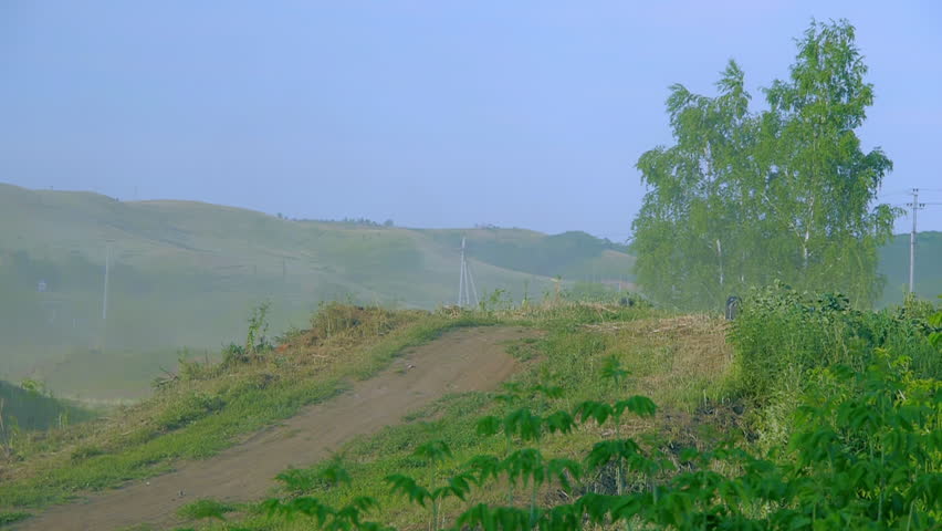 extreme sports motocross motorcycle jumping on a race on high speed rail amped through mud super slow motion racers fly over jump freestyle stunt