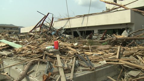 Tsunami Debris Piled Outside Hospital In Japan