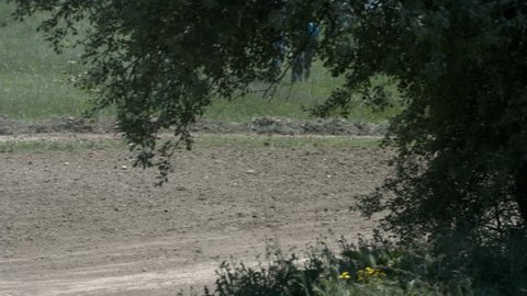 Motocross Championship. Two Motocrossers Driving in the Motocross Race Off Road