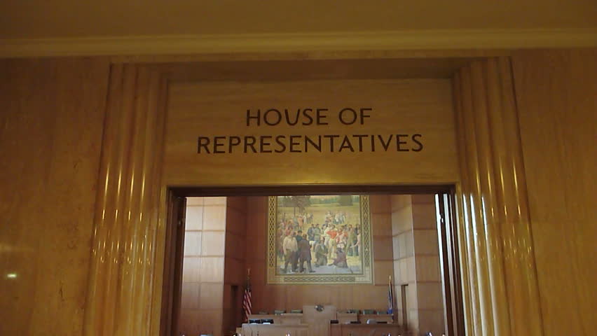 Camera tilt down on the entryway to The House Of Representatives located at the Capital Building in Salem, Oregon.