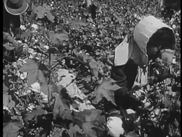 Workers picking cotton in a field, 1940s