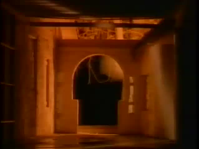 Man on fire walking through hall and falling down, 1980s