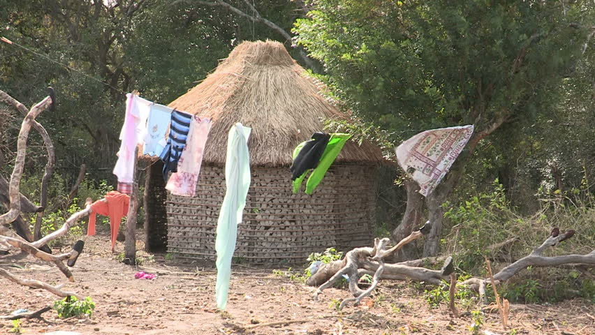 Rural African hut with washing blowing in the wind