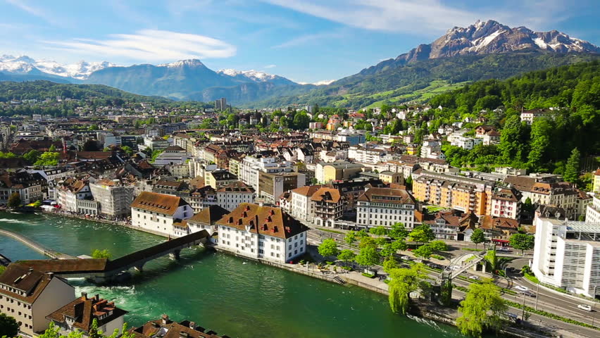 View to Spreuer bridge, Pilatus mountain, Swiss Alps and old city center of Luzern, Switzerland Royalty-Free Stock Footage #17528998