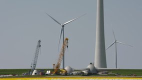 video footage of a wind park in a landscape in the Netherlands near Amsterdam