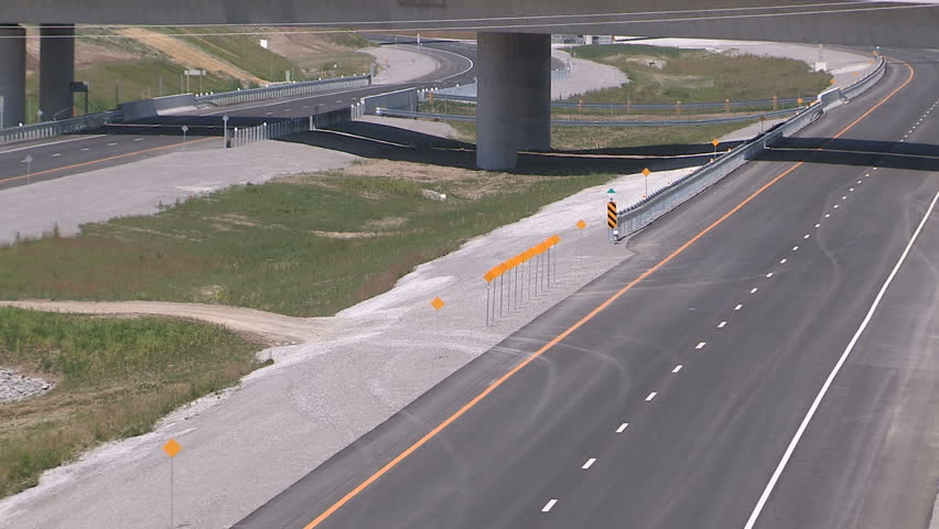 Whitby, Ontario, Canada June 2016 New Ontario highway 407 east through farmland in Whitby
