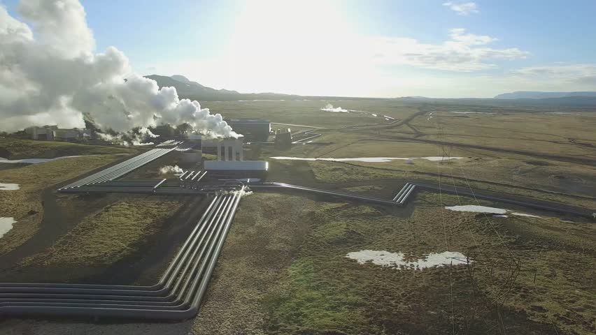 Aerial video of a geothermal power plant in Iceland producing electricity for the city of Reykjavik 