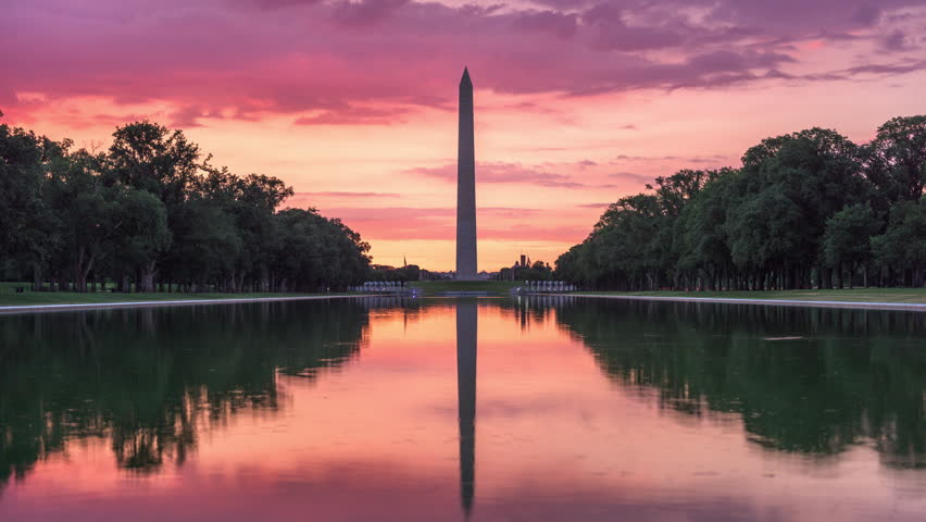 Washington Monument on the Reflecting Pool in Washington DC, USA.