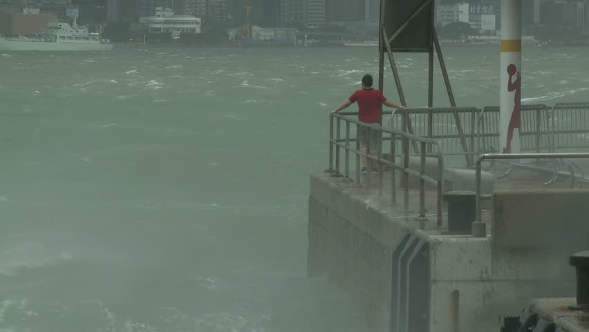 HONG KONG - CIRCA SEPTEMBER 2011: Strong winds from tropical storm Nesat lash