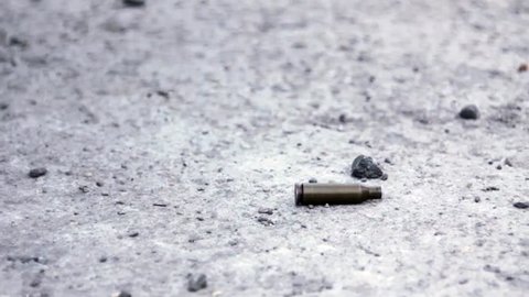 Bullet Shells Falling on the Ground