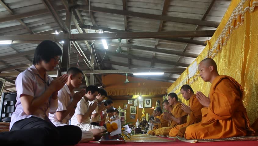 KO CHANG, TRAT/THAILAND - DECEMBER 5: Recitation of mantras by monks in a