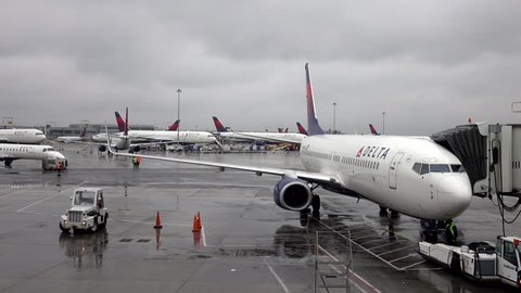 Delta Airlines plane at the gate preparing for take off - NEW YORK - APRIL 10, 2016