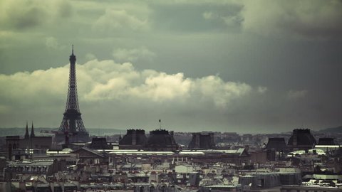 Timelapse Eiffel Tower over Paris Rooftops