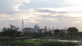 Scenery of sugar factory moment was going to sunset, Sugar Factory Sam Chuk Suphan Buri Thailand, Video HD