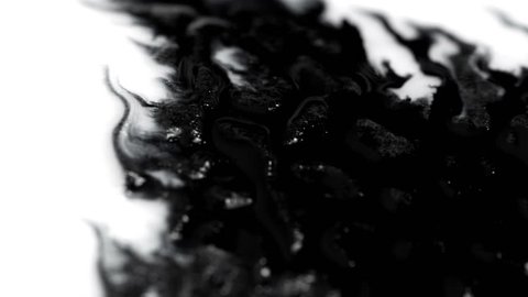 Ink blots are falling and spread. Painted black ink light box element. It is suitable for creation of highly high-quality transitions and effects. 4K UHD footage.