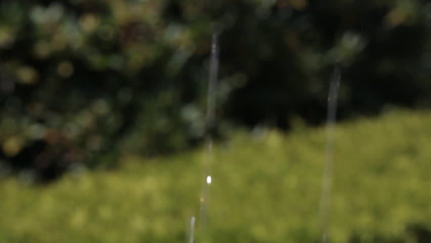 Statue, fountain, naked boy in whose rkuvh two fish