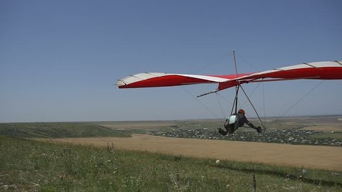 Risky takeoff with a hang glider