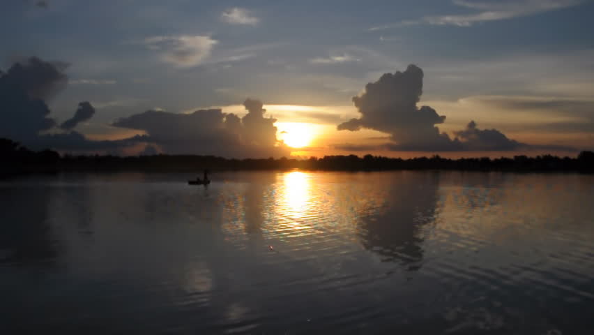 Sunset on river with a beautiful sky.