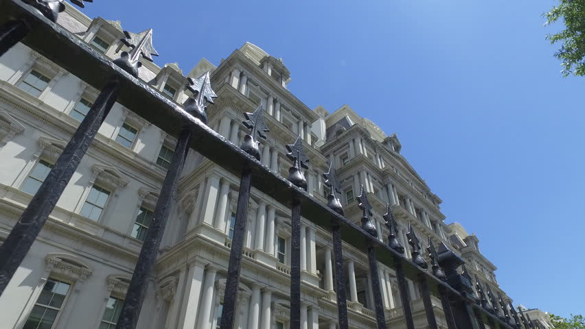 Steadicam shot of fence in front of Eisenhower Office building in Washington DC
