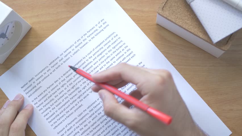 Teacher correcting text with a red marker. Many errors are found. Royalty-Free Stock Footage #17663020