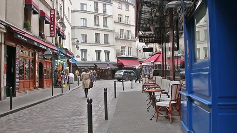 PARIS, FRANCE - March 22, 2016: The narrow streets and cozy cafes of the Latin Quarter of Paris. France