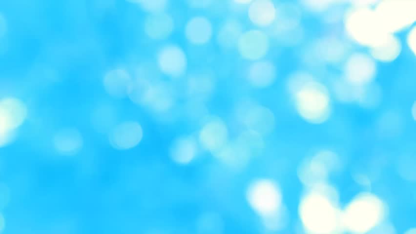Moving particles. Blue tint. Seamless loop.Soft blue bokeh lights,blue animation background,loopable abstract background blue bokeh circles,Seamlessly looping animation of defocused flowing. FHD.