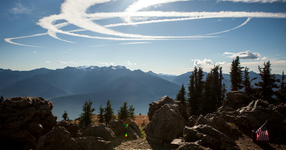 Olympic National Park, Washington, USA - camera pan over Olympic National Park with view towards Port Angeles at a sunny day with moving clouds - Timelapse with motion and zoom in - October 2014