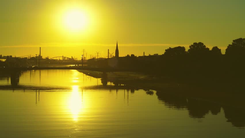 Germany city Mannheim - view to neighbor city Ludwigshafen at the end of the day