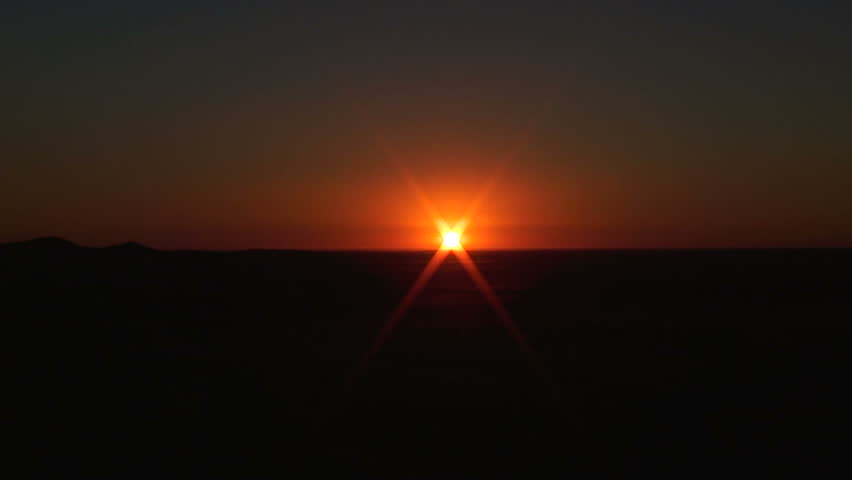 Setting Sun Over a Flat Horizon, Namibia