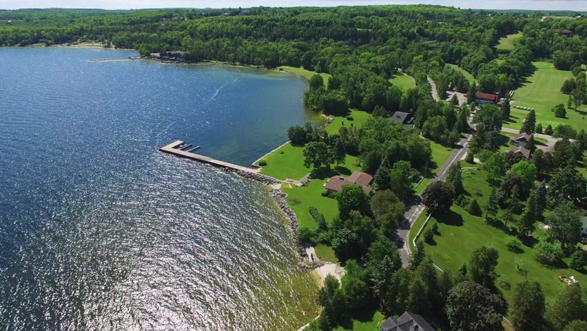 Scenic shorelines in Door County Wisconsin; beaches, docks, golf courses.
