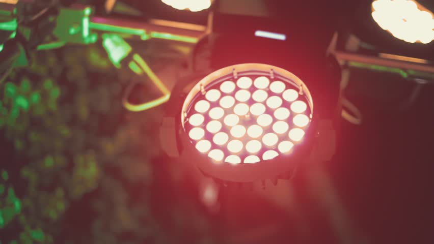 Red spotlights mooving during concert or other event