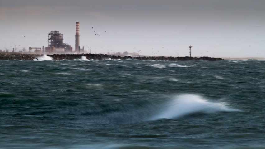 Power Station Near Ocean During Storm