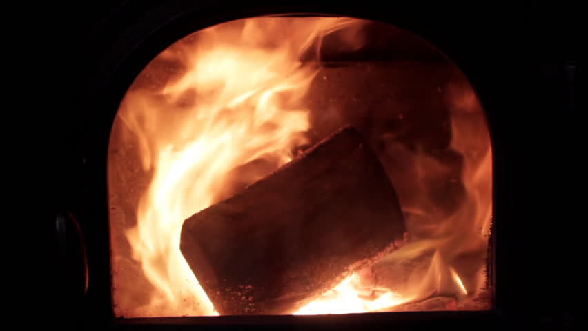 Loop of logs burning in stove