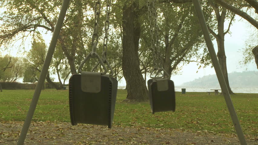 Empty swing seats at a playground