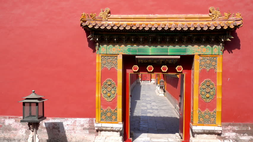 oriental red gate inside Beijing Forbidden City, China