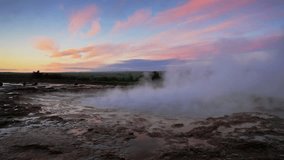 Erupting of the Great Geysir lies in the Haukadalur valley on the slopes of Laugarfjall hill. Southwestern Iceland, Europe. Full HD video (High Definition).