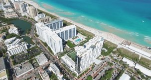 Aerial 4K video of South Beach, Miami Beach. Amazing bird's view on most famous beach in the World, Collins Park and hotels zone.