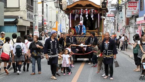 CHOFU, JAPAN - SEPTEMBER 23: Annual autumn festival. Hyottoko show accompanied by Taiko drumming in Chofu, Tokyo on September 23, 2011.
